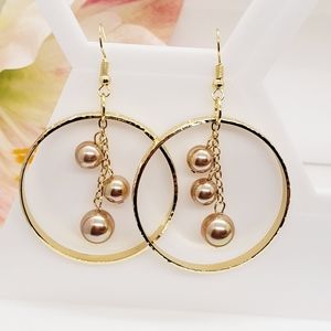 Hawaiian hoop champagne pearl earrings
